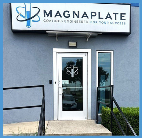Entrance to Magnaplate’s expanded Arlington, Texas headquarters with a new sign and new logo.